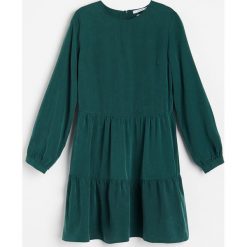Sukienka z Tencel™ Lyocellu -. Sukienki damskie Reserved, bez wzorów, z lyocellu, bez kołnierzyka, bez rękawów. Za 119,99 zł.