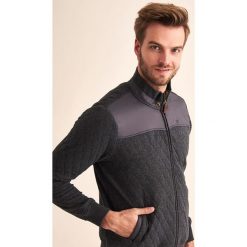 Bluza w kolorze antracytowym. Szare bluzy męskie TATUUM, s, bez wzorów, z bawełny, ze stójką, bez rękawów, bez kaptura. W wyprzedaży za 144,95 zł.