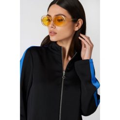 Okulary przeciwsłoneczne damskie: NA-KD Accessories Owalne okulary przeciwsłoneczne – Yellow