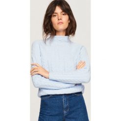 Sweter ze stójką - Niebieski. Niebieskie swetry klasyczne damskie marki KIPSTA, z materiału, młodzieżowe. Za 119,99 zł.