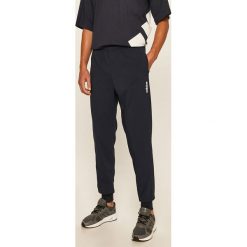Adidas - Spodnie. Niebieskie spodnie męskie Adidas, na co dzień, m, bez wzorów, z poliesteru. Za 169,90 zł.