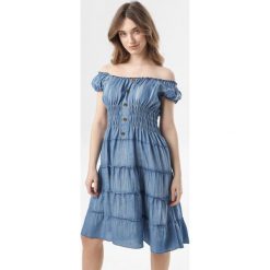 Jasnoniebieska Sukienka Coraebelle. Niebieskie sukienki damskie Born2be, xl, bez wzorów, bez kołnierzyka, bez rękawów, mini. W wyprzedaży za 54,99 zł.