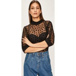 Answear - Bluzka. Czarne bluzki damskie ANSWEAR, s, bez wzorów, z poliesteru, z golfem, bez rękawów. W wyprzedaży za 69,90 zł.