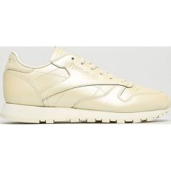 Reebok Classic - Buty Classic. Żółte buty sportowe damskie Reebok Classic, bez wzorów, ze skóry, sportowe, reebok classic. W wyprzedaży za 299,90 zł.