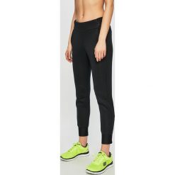Under Armour - Spodnie sportowe. Czarne spodnie damskie Under Armour, s, bez wzorów, z poliesteru. W wyprzedaży za 279,90 zł.