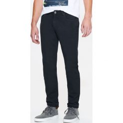 Spodnie męskie slim ze strukturalnej elastycznej tkaniny. Pomarańczowe spodnie męskie Top Secret, na co dzień, na lato, m, bez wzorów, z bawełny, klasyczne. W wyprzedaży za 49,99 zł.
