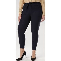 Granatowe Spodnie Undilis. Niebieskie spodnie damskie Born2be, xl, z tkaniny. Za 79,99 zł.