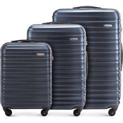 Zestaw walizek 56-3A-31S-90. Pomarańczowe walizki marki Wittchen, z gumy, małe. Za 555,21 zł.