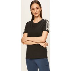 Diadora - T-shirt. Czarne bluzki damskie Diadora, s, z aplikacjami, z bawełny, casualowe, z okrągłym kołnierzem, z krótkim rękawem. W wyprzedaży za 59,90 zł.