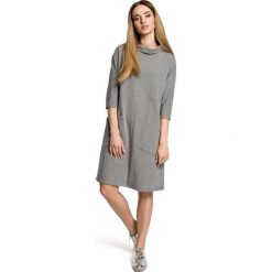 VIDA Sukienka oversize z dużymi kieszeniami i rozcięciem na dole - szara. Czarne sukienki damskie dzianinowe marki Moe, na co dzień, s, biznesowe, oversize. Za 149,00 zł.