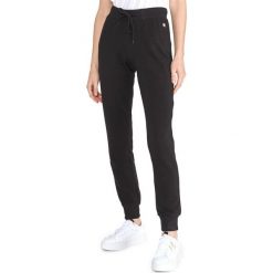 Champion Spodnie dresowe Czarny. Czarne spodnie damskie Champion, l, z elastanu. Za 175,95 zł.