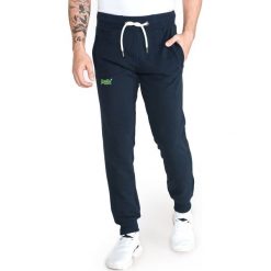 SuperDry Spodnie dresowe Niebieski. Niebieskie spodnie męskie Superdry, s, bez wzorów, z bawełny. Za 350,95 zł.