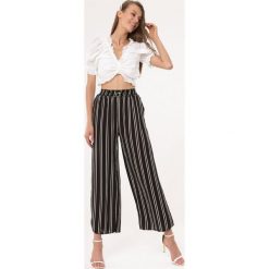 Czarne Spodnie Rests. Czarne spodnie damskie Born2be, m, z tkaniny. Za 59,99 zł.