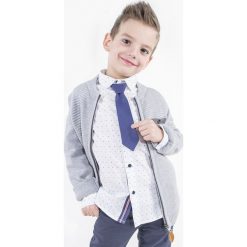 Koszula. Białe koszule chłopięce ELEGANT JUNIOR BOY, bez wzorów, z bawełny, eleganckie, z klasycznym kołnierzykiem, z długim rękawem, długie. Za 62,90 zł.