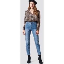 NA-KD Trend Jeansy z klasycznym wykończeniem - Blue. Niebieskie spodnie z wysokim stanem NA-KD Trend, z denimu. Za 161,95 zł.