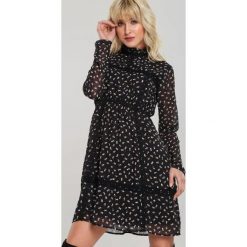 Czarna Sukienka Oullins. Czarne sukienki damskie Renee, s, w jednolite wzory, eleganckie, długie, mini, rozkloszowane. Za 129,99 zł.