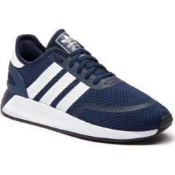 Buty adidas - N-5923 B37959 Conavy/Ftwwht/Cblack. Niebieskie buty sportowe damskie Adidas, bez wzorów, z tworzywa sztucznego, sportowe. W wyprzedaży za 269,00 zł.