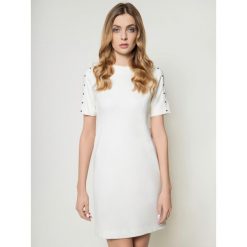 Sukienka koktajlowa Escada Sport Dakima 5031794. Brązowe sukienki damskie Escada Sport, bez wzorów, z elastanu, sportowe, bez kołnierzyka, bez rękawów, sportowe. W wyprzedaży za 1029,00 zł.
