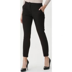 Czarne Spodnie Vosges. Czarne spodnie damskie Born2be, s, z tkaniny. Za 79,99 zł.