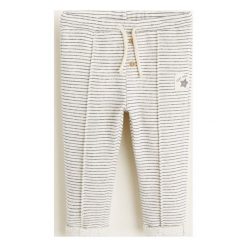 Mango Kids - Spodnie Pipa. Białe spodnie chłopięce Mango Kids, bez wzorów, z bawełny, casualowe. Za 59,90 zł.