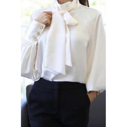 Bluzka damska AGNESA. Białe bluzki damskie Bluzka damska AGNESA, s, bez wzorów, eleganckie, bez kołnierzyka, bez rękawów. W wyprzedaży za 89,00 zł.