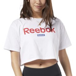 REEBOK TRAINING ESSENTIALS LINEAR LOGO CROP TEE > FI2031. Koszulki damskie Reebok, xl, bez wzorów, z bawełny, street, bez kołnierzyka, z krótkim rękawem. Za 89,99 zł.