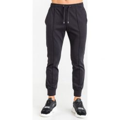 SPODNIE DRESOWE emporio armani. Czarne spodnie męskie xl, z dresówki. Za 849,00 zł.