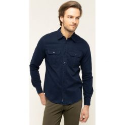 Koszula Calvin Klein Jeans Utility J30J314162. Niebieskie koszule męskie Calvin Klein Jeans, xxl, bez wzorów, z bawełny, casualowe, bez kołnierzyka, bez rękawów. W wyprzedaży za 259,00 zł.