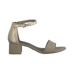 Tamaris Sandały beżowy female beżowy 36. Brązowe sandały damskie Tamaris, bez wzorów, z syntetyku, eleganckie, bez obcasa, bez zapięcia. W wyprzedaży za 119,00 zł.