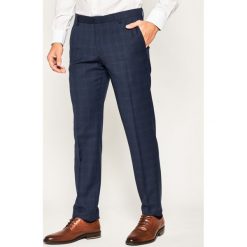 Spodnie garniturowe Tommy Hilfiger Tailored Check Separate TT0TT06717. Niebieskie garnitury męskie Tommy Hilfiger Tailored, m, bez wzorów, z elastanu. W wyprzedaży za 399,00 zł.