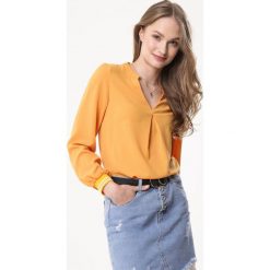 Żółta Bluzka Bestreak. Żółte bluzki damskie Born2be, s, bez wzorów, bez kołnierzyka, z długim rękawem. Za 49,99 zł.