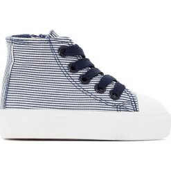 Buty sportowe z płótna w paski 19-25. Niebieskie buty dziewczęce sportowe marki La Redoute Collections, w paski, z materiału, z paskami. Za 52,88 zł.