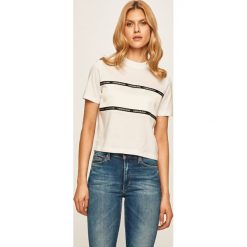 Calvin Klein Jeans - T-shirt. Białe bluzki damskie Calvin Klein Jeans, s, z aplikacjami, z elastanu, z okrągłym kołnierzem. Za 229,90 zł.