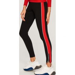 Legginsy z lampasem - Czerwony. Czerwone legginsy damskie marki Reserved, l. Za 69,99 zł.