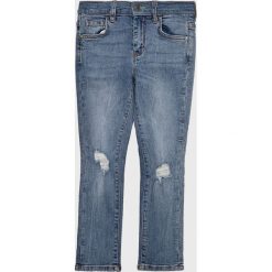 Guess Jeans - Jeansy dziecięce 113-157 cm. Niebieskie spodnie chłopięce Guess Jeans, z aplikacjami, z elastanu. W wyprzedaży za 179,90 zł.