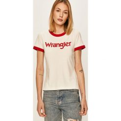 Wrangler - Top. Białe bluzki damskie Wrangler, s, z nadrukiem, z bawełny, casualowe, z okrągłym kołnierzem, z krótkim rękawem. W wyprzedaży za 89,90 zł.