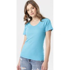 Niebieski T-shirt Blomsea. Niebieskie t-shirty damskie Born2be, s, bez wzorów, z dzianiny, sportowe, bez kołnierzyka. Za 39,99 zł.