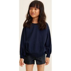 Mango Kids - Szorty dziecięce Isa 110-164 cm. Czarne spodenki dziewczęce Mango Kids, bez wzorów, z elastanu, casualowe. W wyprzedaży za 29,90 zł.