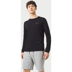 O'Neill Essentials Koszulka Czarny. Czarne koszulki męskie O'Neill, xl, bez wzorów, z bawełny, bez kołnierzyka, długie. Za 137,95 zł.