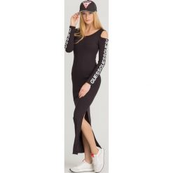 SUKIENKA FIONA GUESS. Czarne sukienki damskie Guess, na imprezę, s, z nadrukiem, z elastanu, z okrągłym kołnierzem, bez rękawów, maxi, dopasowane. Za 399,00 zł.