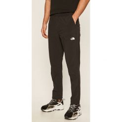 The North Face - Spodnie. Czarne spodnie męskie The North Face, na co dzień, s, z aplikacjami, z elastanu. W wyprzedaży za 279,90 zł.