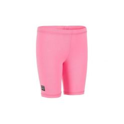 Spodenki 3/4 UV surfing 100 dla malucha. Różowe topy damskie NABAIJI, s, bez wzorów, z elastanu, sportowe, bez kołnierzyka. Za 14,99 zł.