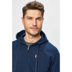 Under Armour - Bluza. Niebieskie bluzy męskie Under Armour, s, z nadrukiem, z bawełny, z kapturem, bez rękawów, z kapturem. W wyprzedaży za 199,90 zł.