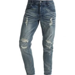 Tigha BILLY THE KID Jeansy Slim Fit light blue ripped. Niebieskie jeansy męskie marki Tigha. W wyprzedaży za 441,75 zł.
