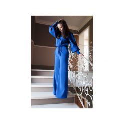 Niebieski kombinezon damski z szerokimi nogawkami. Niebieskie kombinezony damskie marki Bien fashion, na imprezę, l, bez wzorów, z tkaniny, eleganckie, bez kołnierzyka, bez rękawów. Za 199,00 zł.