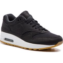 Buty NIKE - Air Max 1 319986 037 Black/Black Gum/Light Brown. Czarne buty damskie nike air max Nike, bez wzorów, z tworzywa sztucznego, sportowe. W wyprzedaży za 449,00 zł.
