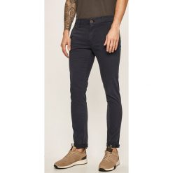 Guess Jeans - Spodnie. Niebieskie spodnie męskie Guess Jeans, na co dzień, m, z aplikacjami, z elastanu, casualowe. Za 369,90 zł.