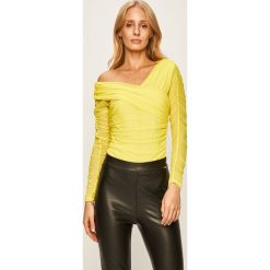 Guess Jeans - Bluzka. Czarne bluzki damskie s, z aplikacjami, z elastanu. Za 369,90 zł.