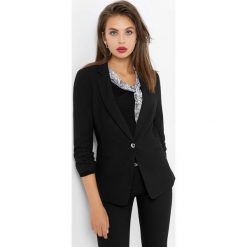 Taliowany żakiet z rękawem 3/4. Czarne marynarki i żakiety damskie Orsay, z elastanu, eleganckie. Za 169,99 zł.