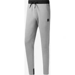 Reebok Spodnie dresowe Szary. Szare spodnie męskie Reebok, xl, bez wzorów, z bawełny. Za 326,95 zł.